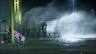 The North Sea crashes into the Dagebull ferry terminal, in Dagebull, Germany
