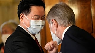 Speaker of the Czech Senate, Milos Vystrcil, right, welcomes Taiwan foreign minister Joseph Wu during his visit to Prague.