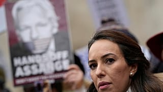 Julian Assange's partner Stella Moris, speaks outside the High Court after a hearing, in London, Monday, Jan. 24, 2022. 