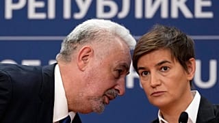 Montenegro's Prime Minister Zdravko Krivokapic, left, speaks with his Serbian counterpart Ana Brnabic during a press conference in Belgrade, Serbia, Wednesday, Nov. 3, 2021. 