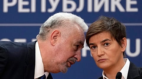 Montenegro's Prime Minister Zdravko Krivokapic, left, speaks with his Serbian counterpart Ana Brnabic during a press conference in Belgrade, Serbia, Wednesday, Nov. 3, 2021. 