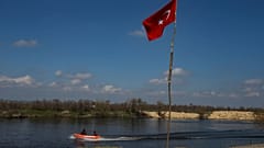 Turkish special forces on patrol along the Maritsa river near the Greek border