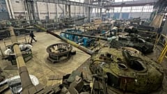 Workers repair T-64 tanks at the Tank Repair Plant in Kharkiv, Ukraine, Monday, Jan. 31, 2022. 