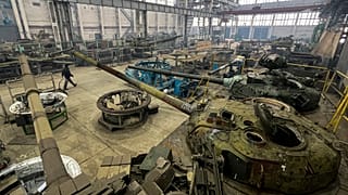 Workers repair T-64 tanks at the Tank Repair Plant in Kharkiv, Ukraine, Monday, Jan. 31, 2022. 
