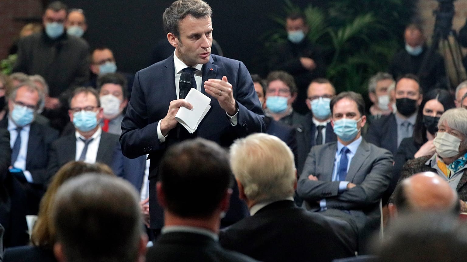 France's President Emmanuel Macron delivers a speech during a meeting, in Lievin, northern France, Wednesday, Feb. 2, 2022. 