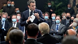 France's President Emmanuel Macron delivers a speech during a meeting, in Lievin, northern France, Wednesday, Feb. 2, 2022. 