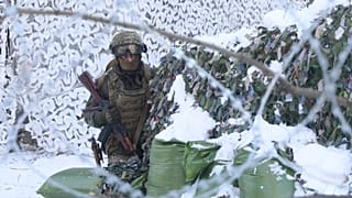Солдаты Национальной гвардии участвуют в тактических учениях в Припяти, 4 февраля 2022 г.