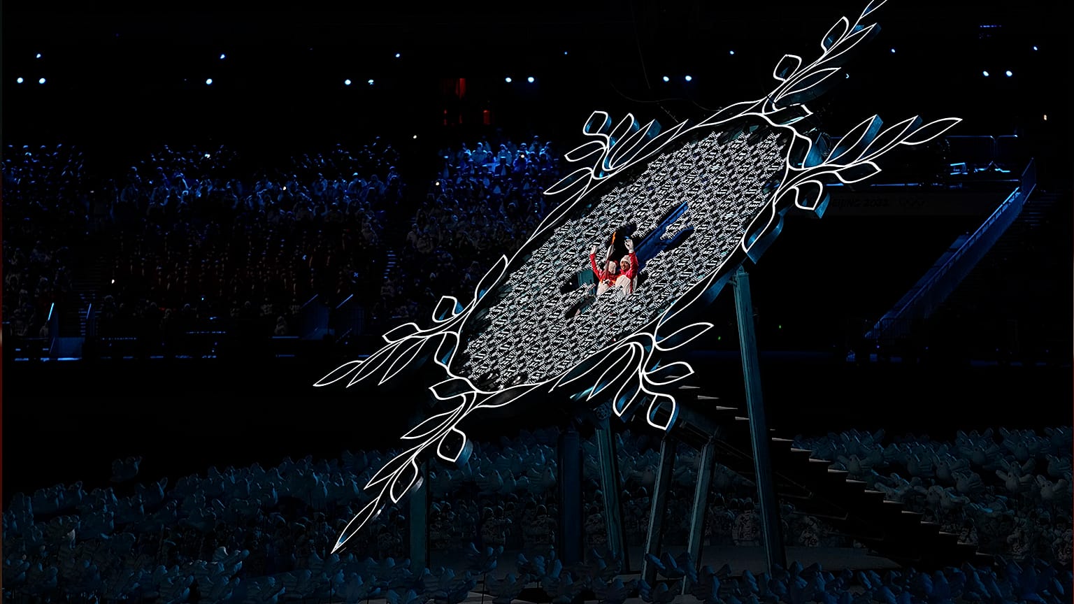 China's athletes Dinigeer Yilamujian and Zhao Jiawen prepare to light the cauldron during the opening ceremony of the 2022 Winter Olympics