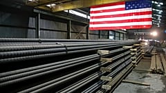 In this May 9, 2019, photo, steel rods produced at the Gerdau Ameristeel mill in St. Paul, Minn. await shipment.