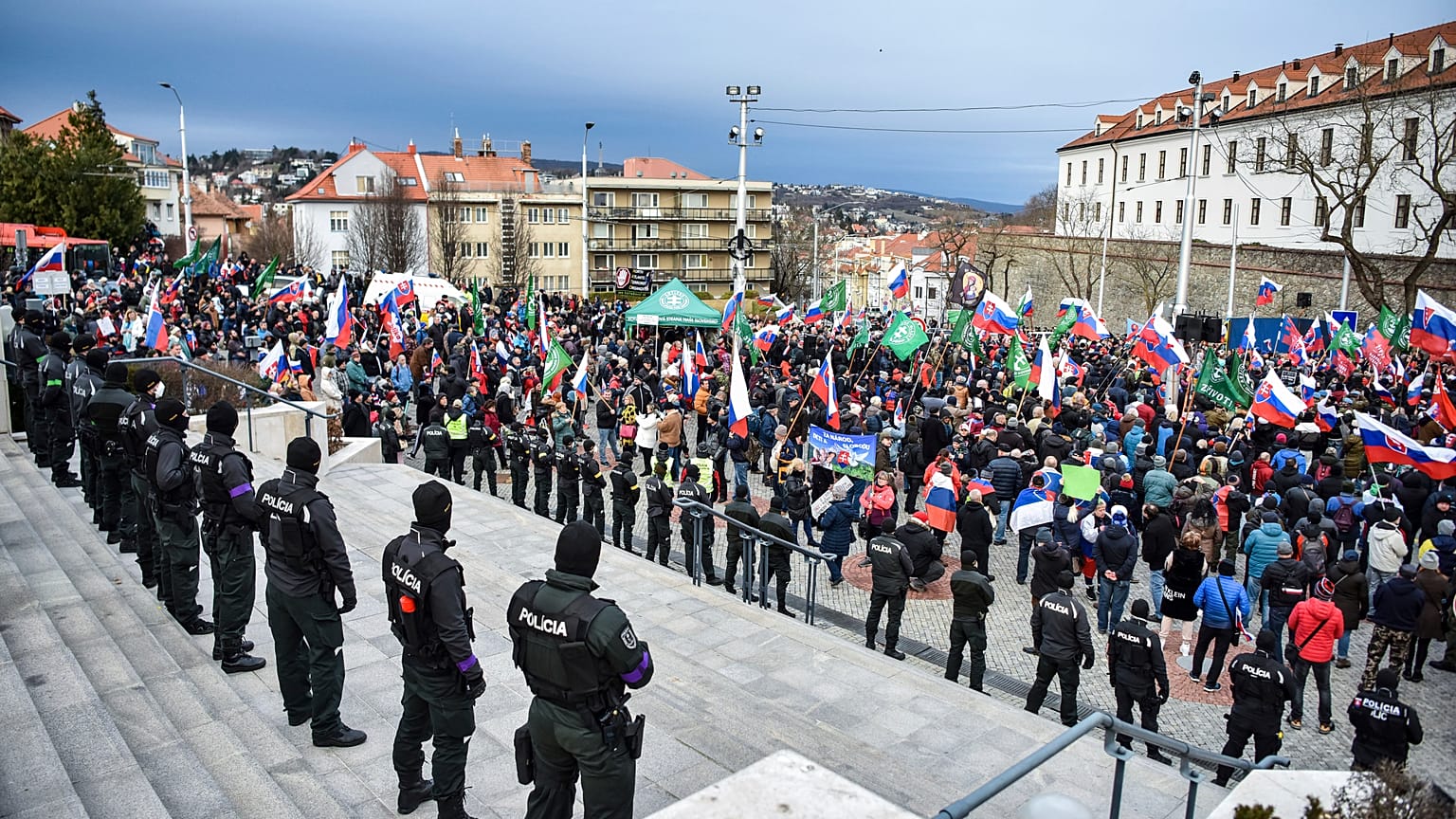 Protesters gathered in front of the parliament during the debate on the new Defense Cooperation Agreement.