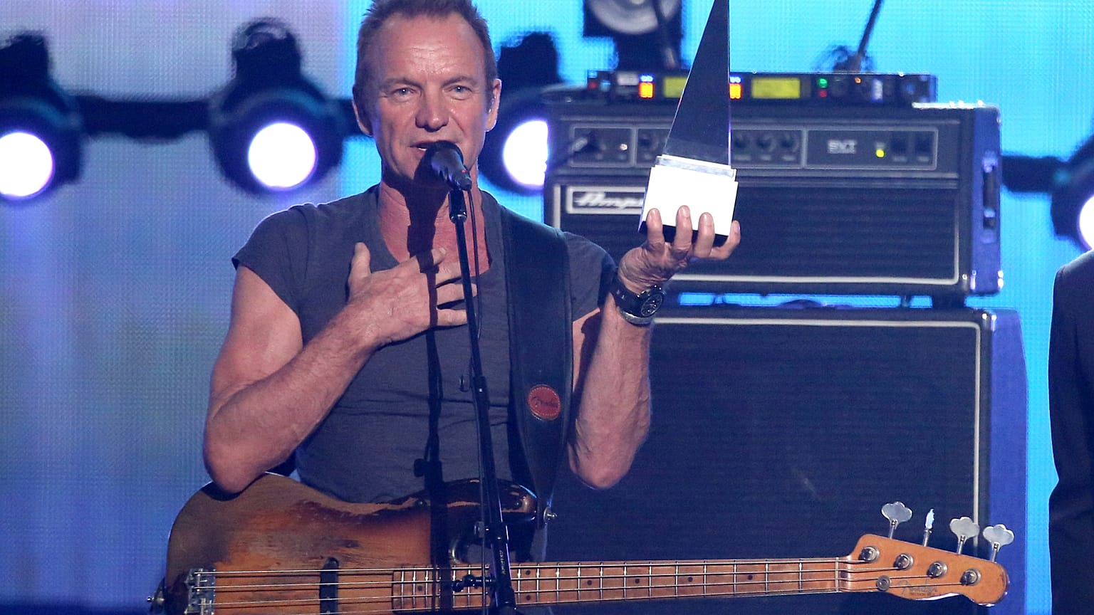 Sting accepts the award of merit at the American Music Awards at the Microsoft Theater on Sunday, Nov. 20, 2016, in Los Angeles