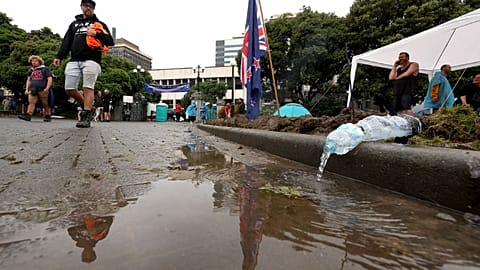 New Zealand anti-vaccine mandate protesters dig trenches to stay dry