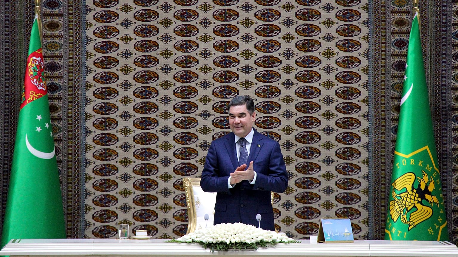 Turkmenistan's President Gurbanguly Berdymukhamedov applauds as he attends an opening ceremony of a chemical plant in 2018