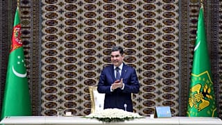 Turkmenistan's President Gurbanguly Berdymukhamedov applauds as he attends an opening ceremony of a chemical plant in 2018