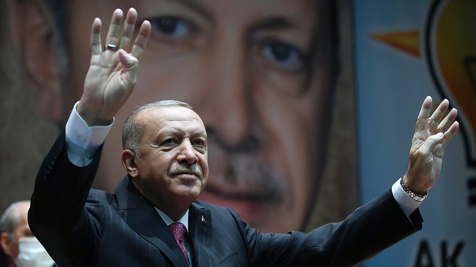 Turkey's President Recep Tayyip Erdogan gestures as he addresses his party members, in Ankara in 2020