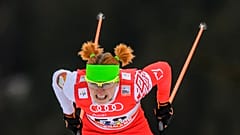 Валентина Каминская выступает за сборную Беларуси на этапе Кубка мира по лыжным гонкам в Давосе, декабрь 2014 г.