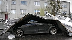 A storm has blown a roof of an apartment house on a street in Gelsenkirchen, Germany, Thursday, Feb. 17, 2022
