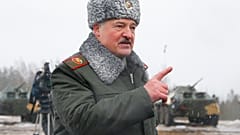 Belarusian President Alexander Lukashenko speaks to journalists at the Osipovichi training ground.