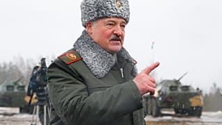 Belarusian President Alexander Lukashenko speaks to journalists at the Osipovichi training ground.