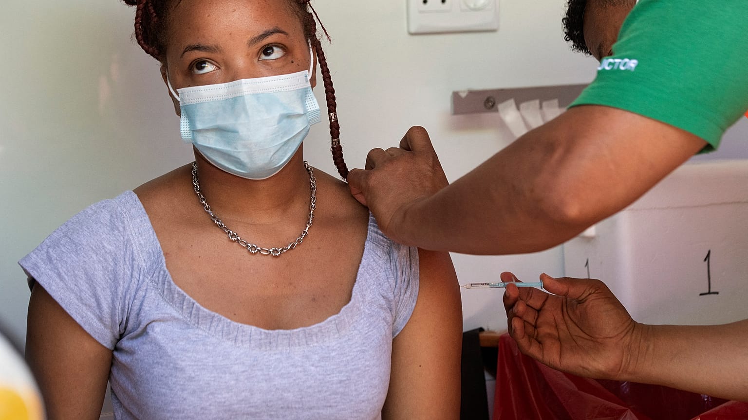 A woman is vaccinated in Cape Town, South Africa