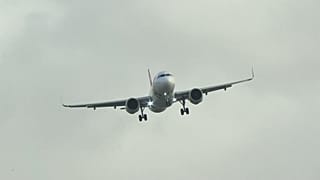 An Air Portugal plane abandoning its landing at the Heathrow airport in high winds