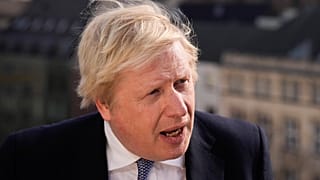 Britain's Prime Minister Boris Johnson briefs the media during the Munich Security Conference in Munich, Germany, Saturday, Feb. 19, 2022.