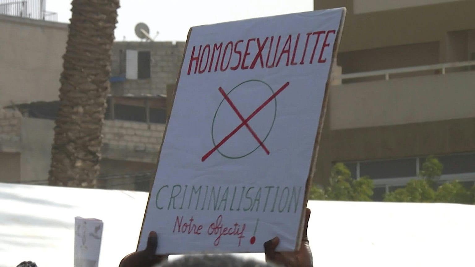 People at demonstration demanding tougher laws against homosexual activity