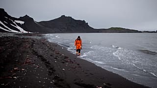 Antarctica's white landscape is turning dark in the area where thousands among tourists and researchers flock every summer.
