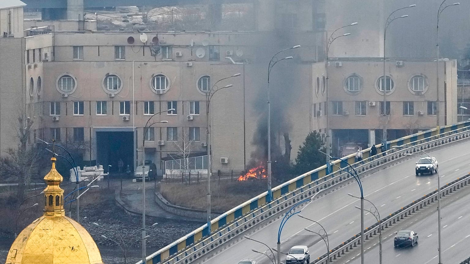 Smoke and flame rise near a military building after an apparent Russian strike in Kyiv