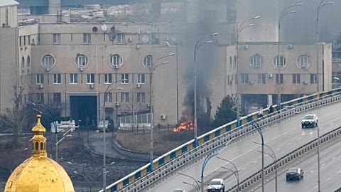 Smoke and flame rise near a military building after an apparent Russian strike in Kyiv