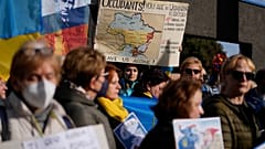Ukrainians who live in Rome protest near the Russian Embassy in Rome, Thursday, Feb. 24, 2022. 