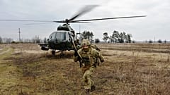Service members of the Ukrainian Air Assault Forces take part in tactical drills at a training ground in an unknown location in Ukraine in February 2022.