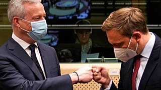 French Finance Minister Bruno Le Maire, left, greets German Finance Minister Christian Lindner during a meeting of eurogroup finance ministers 