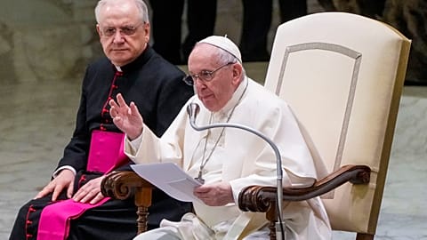 Pope Francis speaks during his weekly general audience in the Paul VI Hall at the Vatican, Wednesday, Feb. 23, 2022.