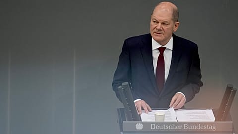 German Chancellor Olaf Scholz delivers a speech on the Russian invasion of the Ukraine during a meeting of the