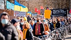 Protestors take part in a demonstration against Russia's military intervention in Ukraine in Bern, Switzerland, Saturday, February 26, 2022.