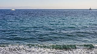 The unidentified bodies were found on the shore of the eastern Greek island.