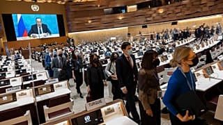 Ambassadors and diplomats leave the room while Russia's foreign minister speaks at the Conference on Disarmament in Geneva on Tuesday.