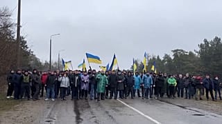 Video footage shared by Enerhodar's City Council showed people en masse standing on the street and blocking the entrance to the city in Enerhodar, Ukraine, on March, 3, 2022.