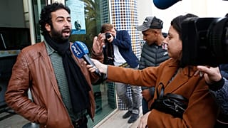 الصحفي والناشط عمر الراضي بعد جلسة استماع في محكمة الدار البيضاء، المغرب