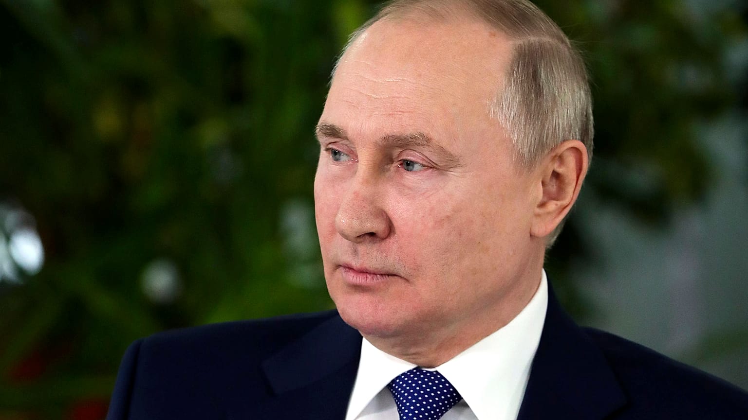 Russian President Vladimir Putin speaks to representatives of the flight crew of Russian airlines as he visits to Aeroflot Aviation School outside Moscow, Russia