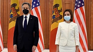 US Secretary of State Antony Blinken, left, poses with Moldovan President Maia Sandu