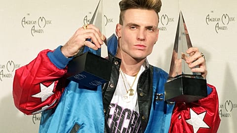 Vanilla Ice displays his awards he won in the rock and rap catagories at the American Music Awards in Los Angeles, Calif., on Jan. 28, 1991