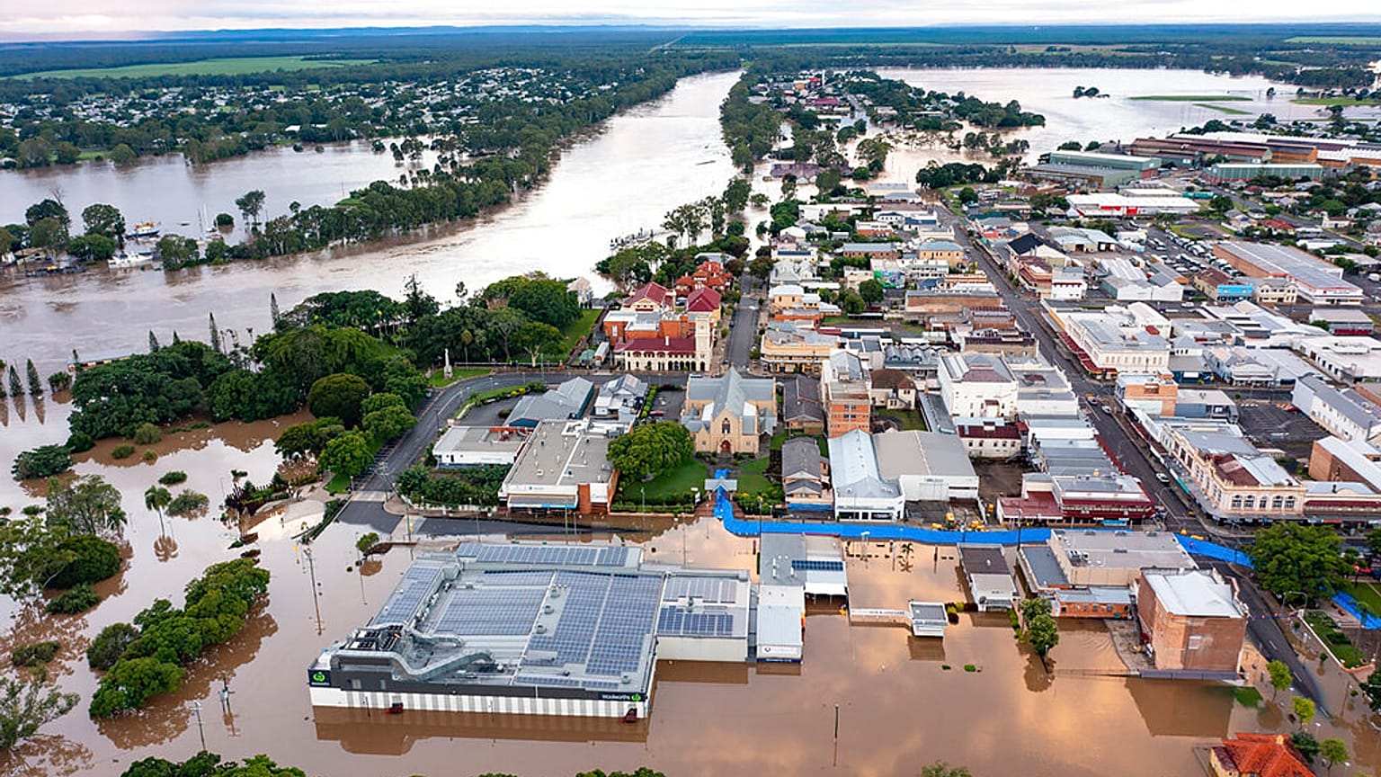 Heavy rain is bringing record flooding to some east coast areas while the flooding in Brisbane.