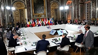 President Macron hosts his counterparts at the Palace of Versailles.