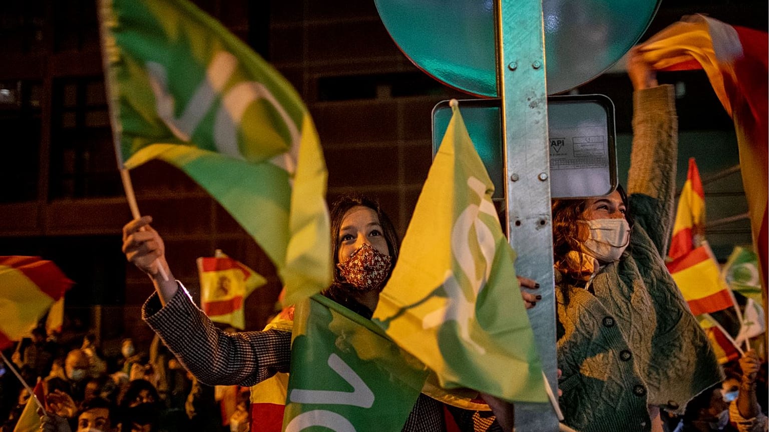 People gather outside the Vox party headquarters in Madrid last May.