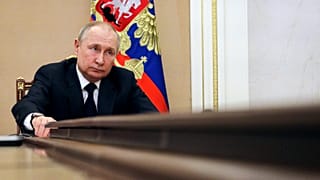 Russian President Vladimir Putin chairs a meeting with members of the government via teleconference in Moscow, Thursday, March 10, 2022.