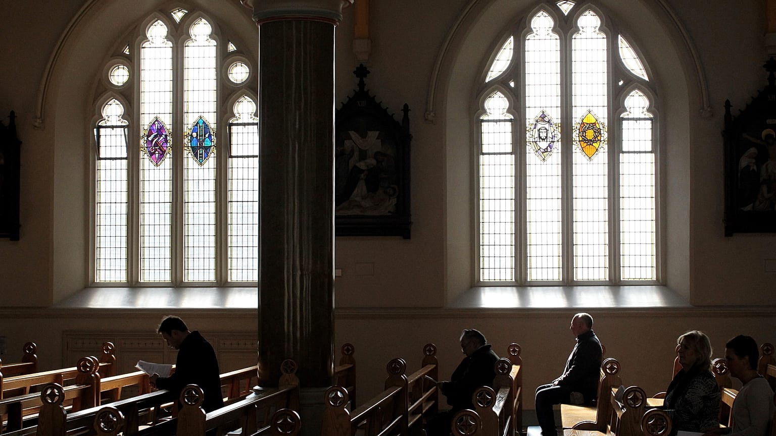 Mass at St. Peter's Roman Catholic Cathedral, in West Belfast.
