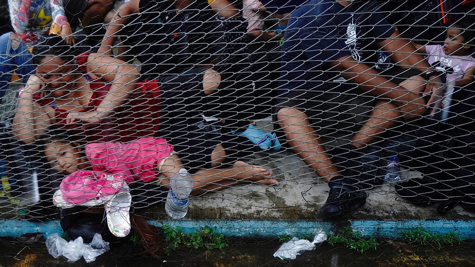 Migrants, mostly from Central America, rest upon their arrival to Huixtla, Chiapas state, Mexico