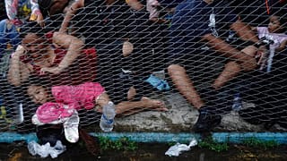 Migrants, mostly from Central America, rest upon their arrival to Huixtla, Chiapas state, Mexico